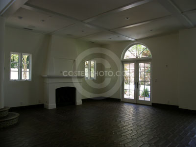 (016)-Living-Rm.-Fireplace-@-arched-door_2.JPG